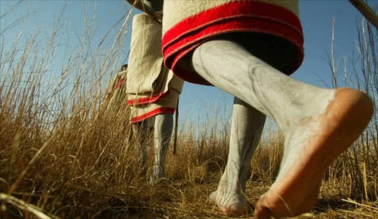 Picture Of Abakhwetha Walking In The Jungle. Picture Supplied